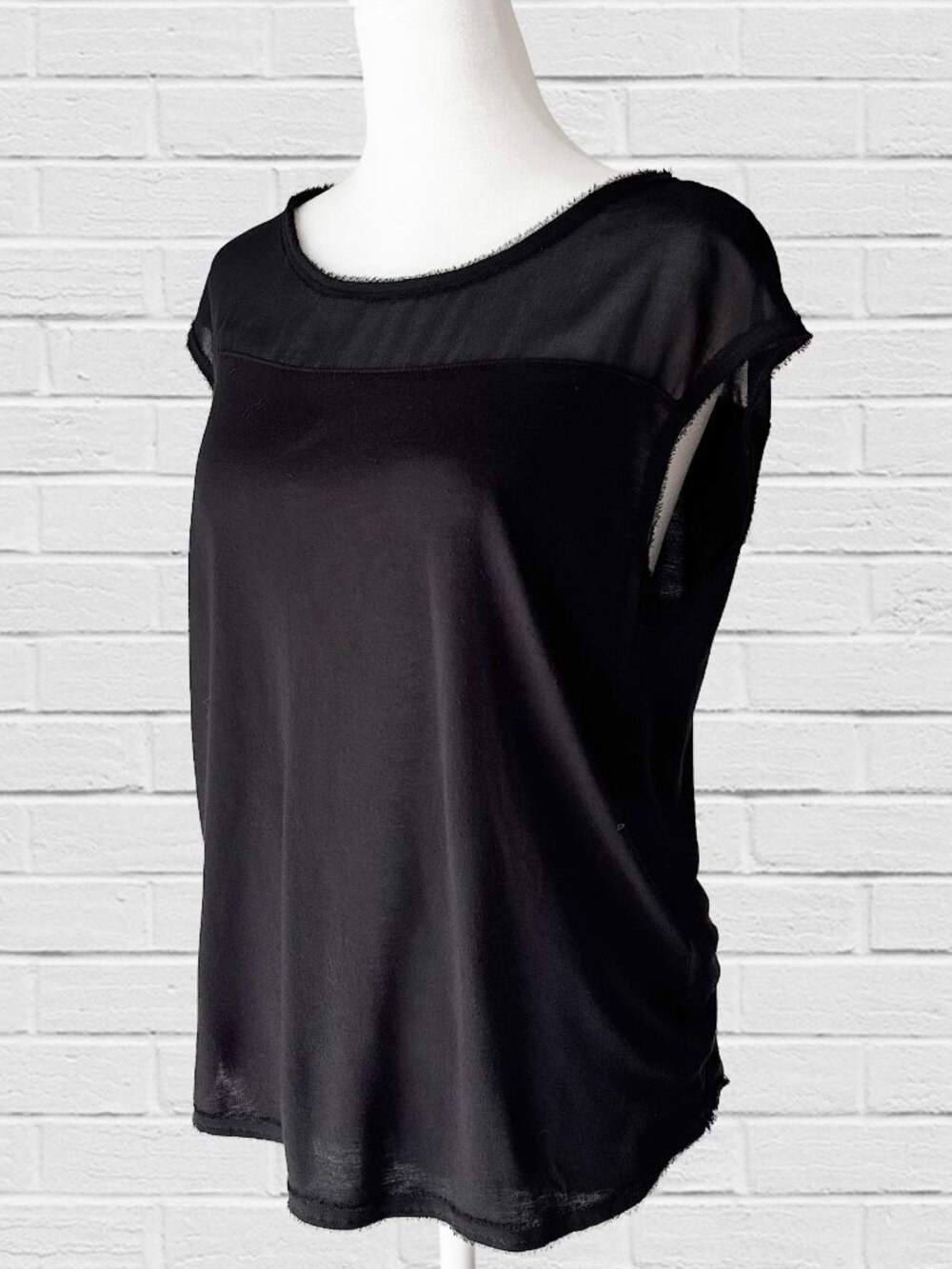 black cap sleeve top with sheer placket